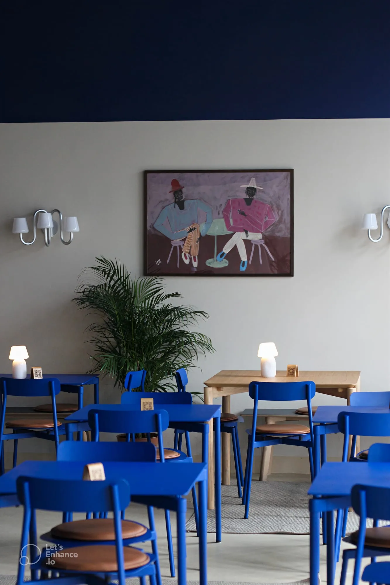 BQ Canteen interior with blue chairs