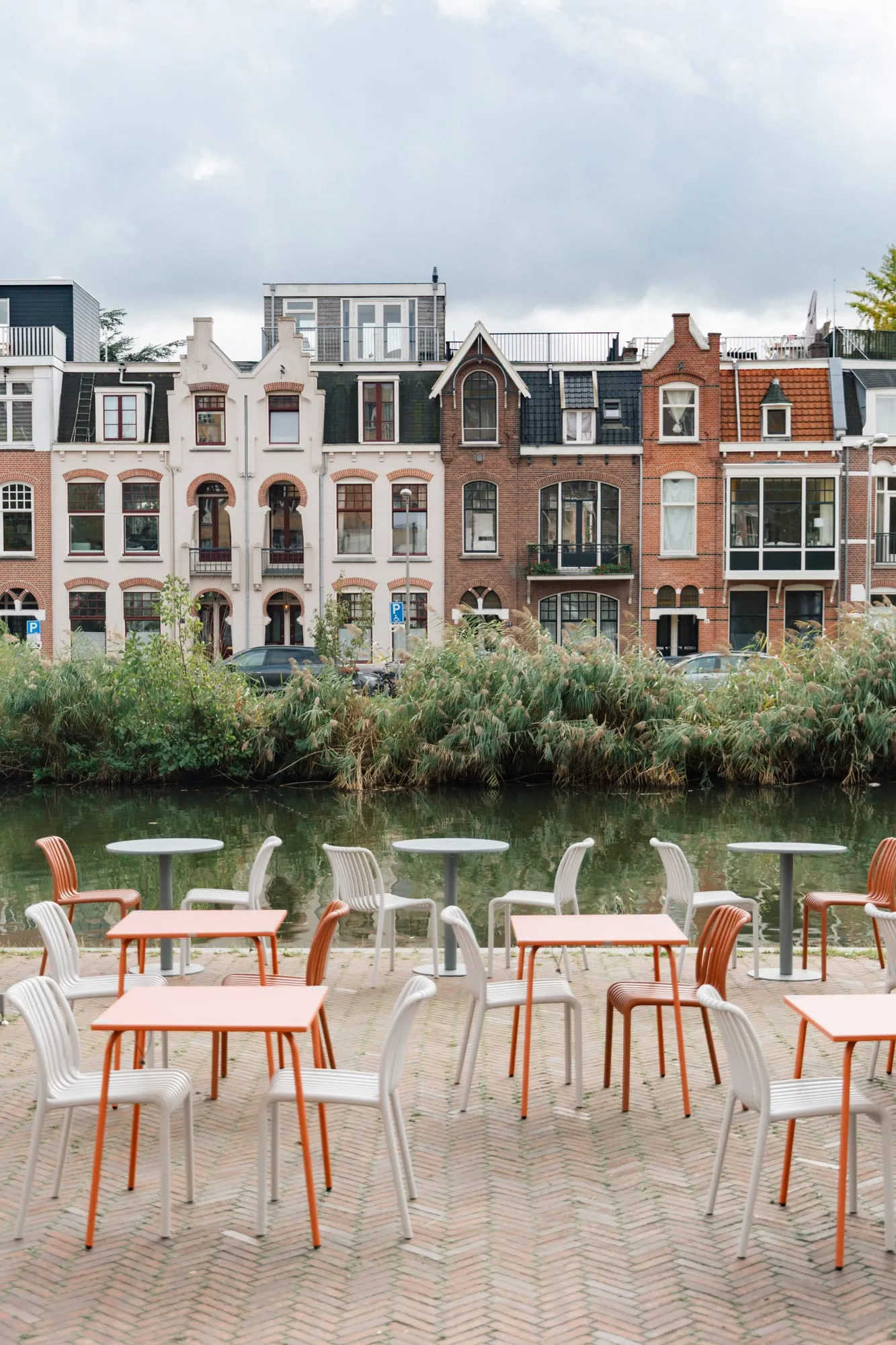 The BQ Canteen terrace with pink tables and chairs